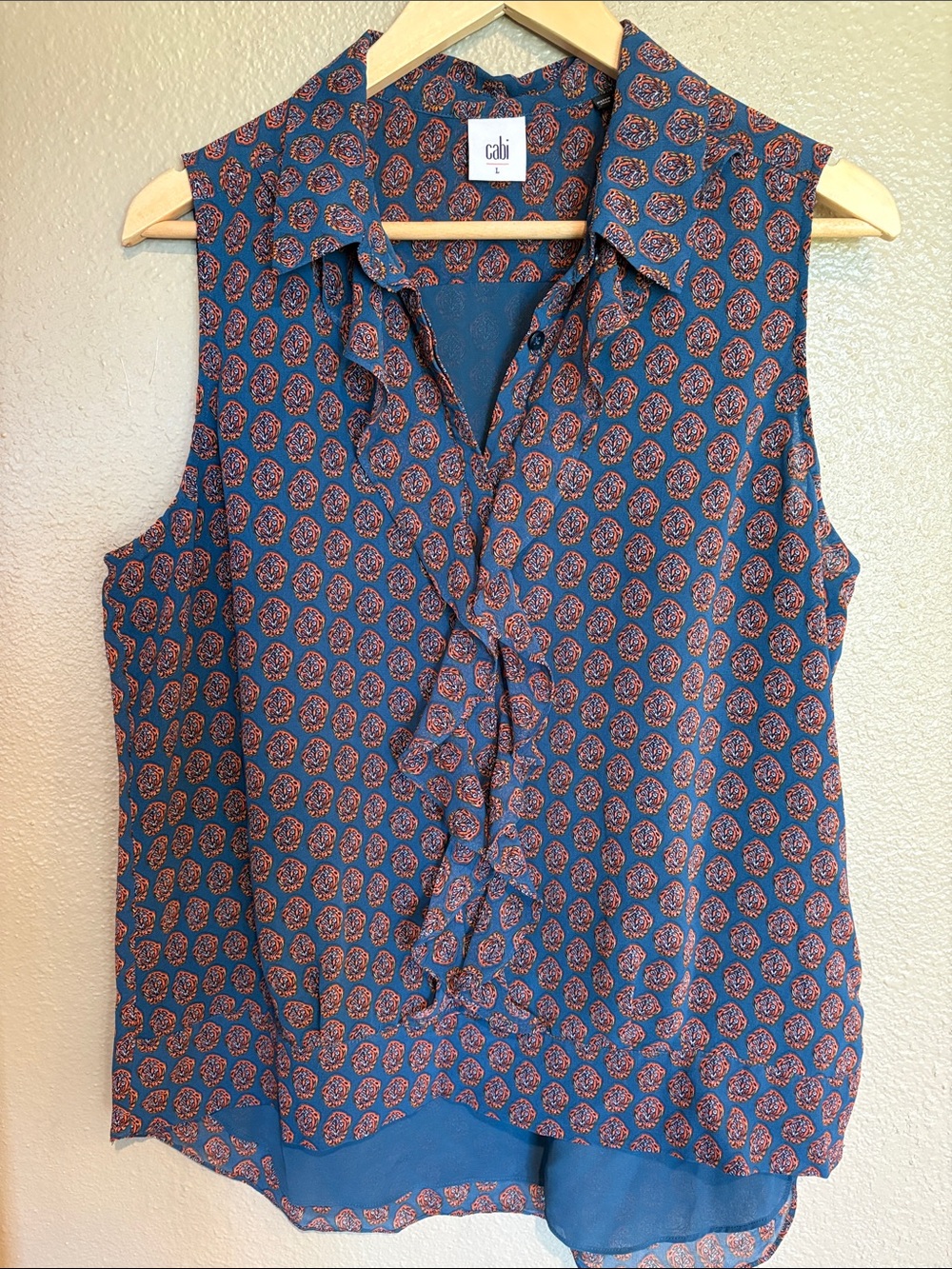 CAbi Sleeveless Ruffle and Button Top